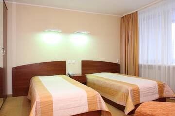 Фото номера Двухместный номер с 2 отдельными кроватями и душем Отель Slavinasport Hotel г. Жлобин 4